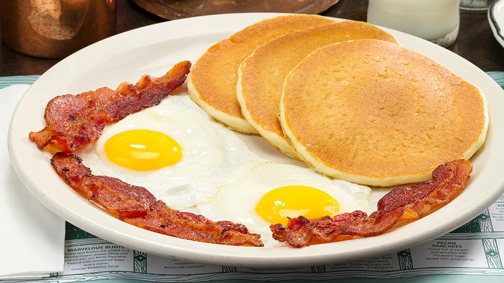 a plate of pancakes, eggs, and bacon from the pancake pantry in gatlinburg tn