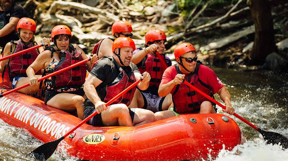 image of a group of white water rafters from smoky mountain outdoors