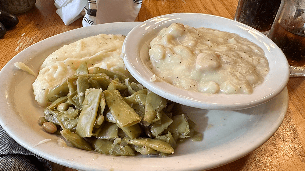 chicken and dumplings with mashed potatoes and green beans at the old mill restaurant in pigeon forge tn