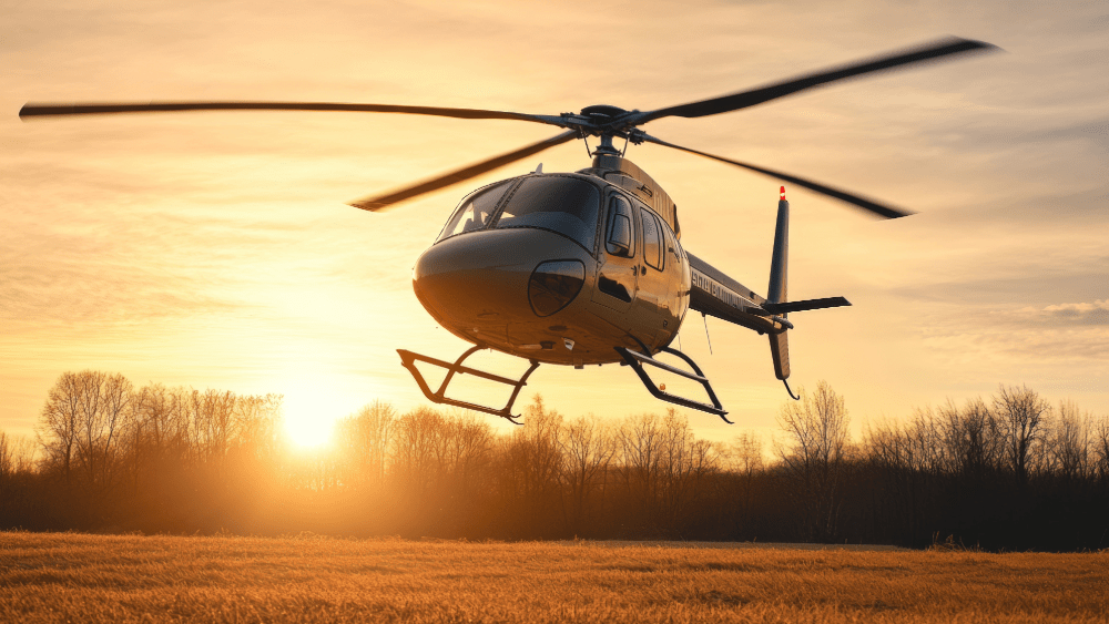 A helicopter soars against a glowing orange Smoky Mountain sunset sky, an unforgettable end to a day of sightseeing