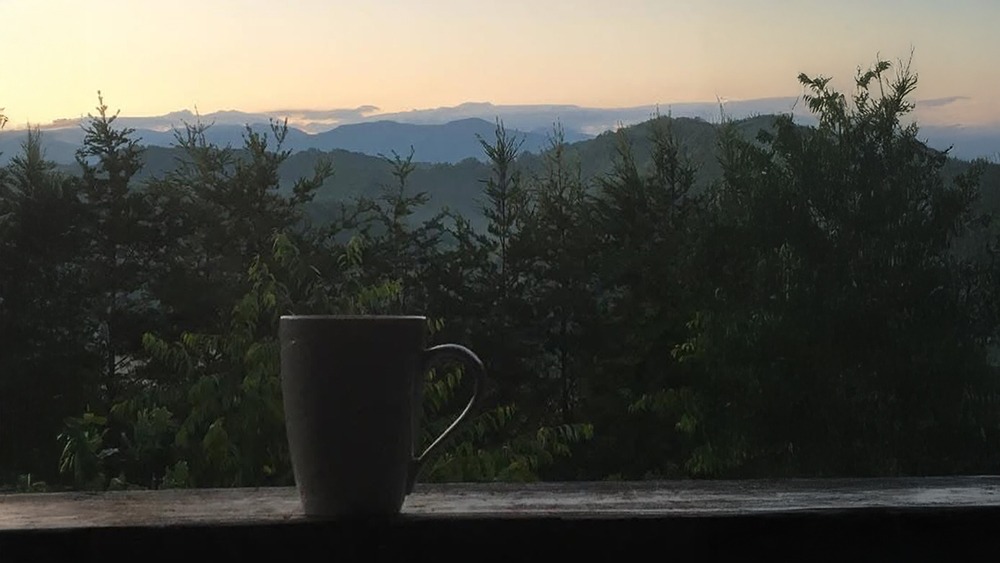 morning coffee on the deck of hapey place in sevierville tn
