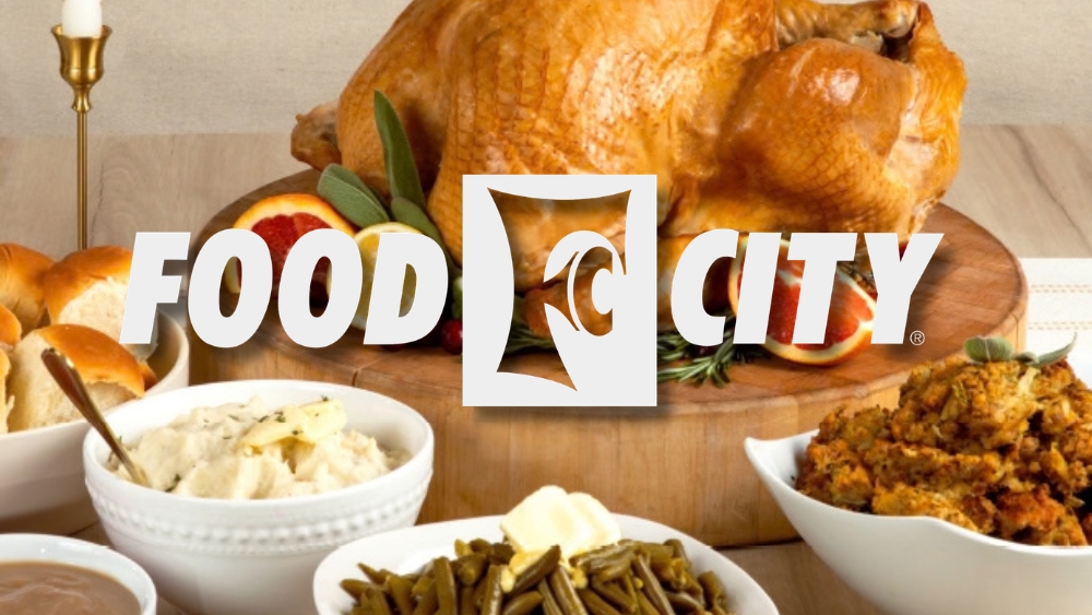 food city logo over thanksgiving spread