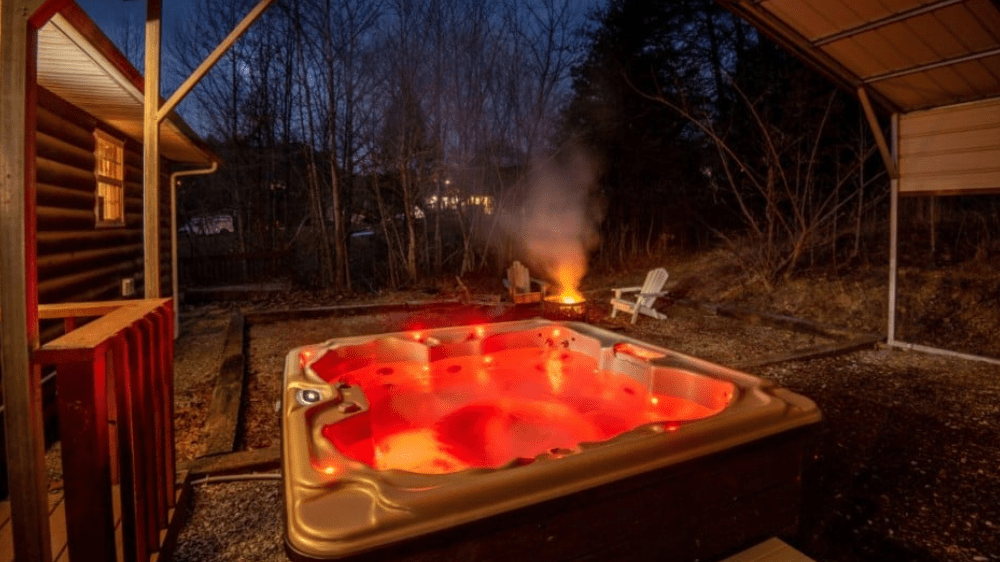 hot tub and fire pit area at sleepy bear ranch