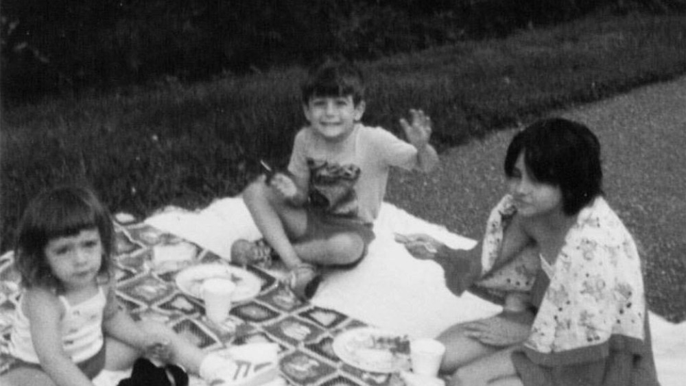 angie with her brother and sister as kids in the smoky mountains