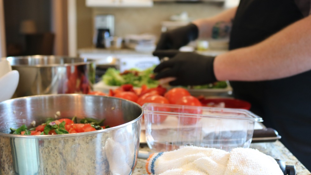 A private chef from CookinGenie preppingingredients.
