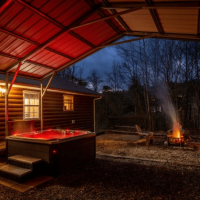 sleepy bear ranch pigeon forge cabin hot tub and covered awning