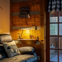 Living room lamp on at dusk at Hapey Memories