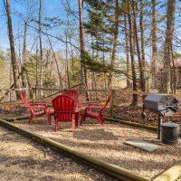 Outdoor seating and grill at Hapey Memories