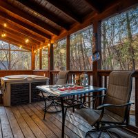 Timeless Tranquility screen back porch and hot tub