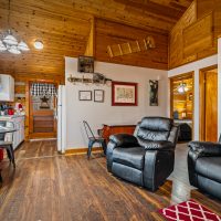 View into living area and kitchen at Hapey Memories