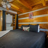 View of bedroom one and laundry at Hapey Memories