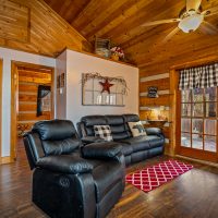 View of living area and hall to bedrooms at Hapey Memories