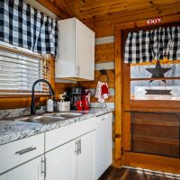 View of sink and front door at Hapey Memories