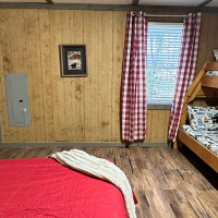 sleepy bear ranch bedroom 1 with bunkbed and window
