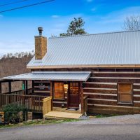 Exterior view of the side of Little Bear and driveway
