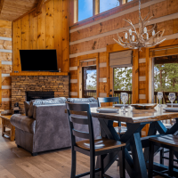 View of dining table and living from from side door