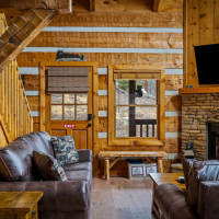 View of front door from dining area at Little Bear Cabin