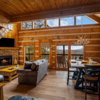 Wide view of Little Bear living room and dining area