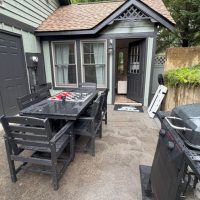 Outdoor dining area at sunny view cabin.