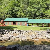 Playground and pavillion beside creek at Shagbark.