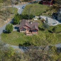 Aerial view of Sunny View Cabin surrounded by trees in Sevierville TN near Great Smoky Mountains National Park