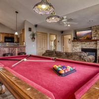 Billiard table with racked balls ready for play at Sunny View Cabin vacation rental in the Smoky Mountains Tennessee