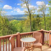 Outdoor deck with panoramic mountain views at Sunny View Cabin in Sevierville TN