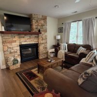 View from living room to bedroom at sunny view cabin.
